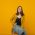 glamorous-female-model-with-straight-hair-sitting--SY82H9H