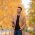 young-man-in-autumn-in-the-park-outdoors-TUEPKGY