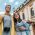 low-angle-view-of-happy-mixed-race-man-and-cheerfu-YBEZPLU