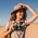 woman-in-desert-walking-on-safari-6S7JRNJ