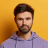 serious-handsome-bearded-european-guy-looks-direct-7GEVKUZ